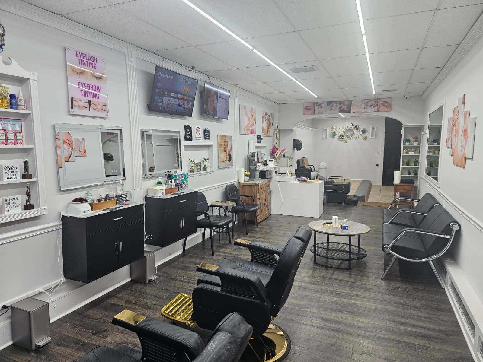 The brow and lash bar at Creative Brows — styling chair, mirrors, and product shelves in the newly renovated Lynbrook studio